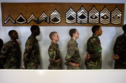 Cadets with the Maryland National Guard’s Freestate ChalleNGe Academy stand at the position of parade rest while waiting in line at the academy’s mess hall, Nov. 17, 2015. The Youth ChalleNGe program follows a quasi-military program of instruction as a way to instill discipline and esprit-de-corps in cadets. 