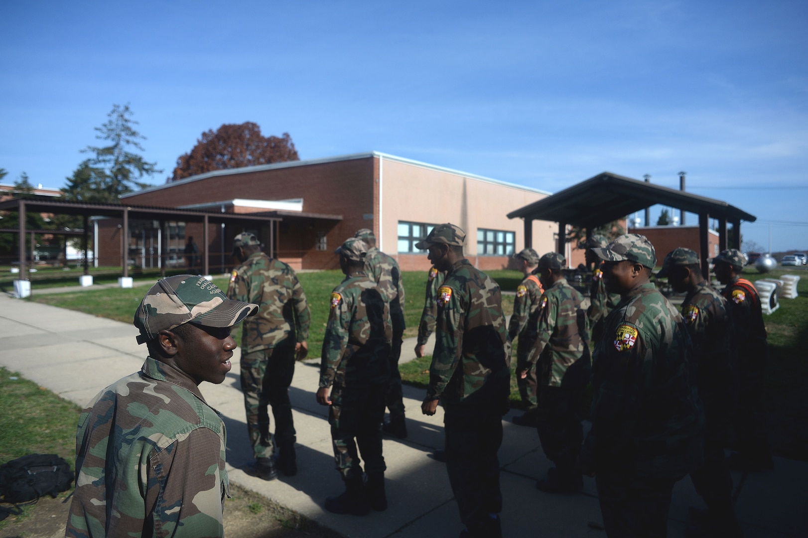 The rhythm of boots marching in unison echoes off the surrounding buildings as a cadet with the Maryland National Guard’s Freestate ChalleNGe Academy marches his platoon to the academy’s mess hall, Nov. 17, 2015. For cadets at the academy—part of the National Guard’s Youth ChalleNGe Program, which provides a path for "at-risk" youth to  receive a GED or high school diploma—marching is an everyday part of life at the academy where a military-style boot camp environment is used to create structure and build discipline among cadets.