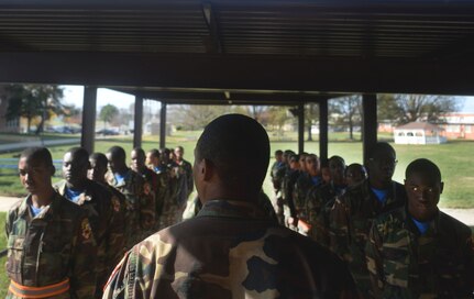 All eyes are on the platoon leader as cadets at the Maryland National Guard’s Freestate ChalleNGe Academy wait in formation for the command to enter the academy’s mess hall for lunch, Nov. 17, 2015. Part of the National Guard's Youth ChalleNGe program, the Freestate Academy follows a quasi-military program of instruction as a way to instill discipline and esprit-de-corps in cadets. 