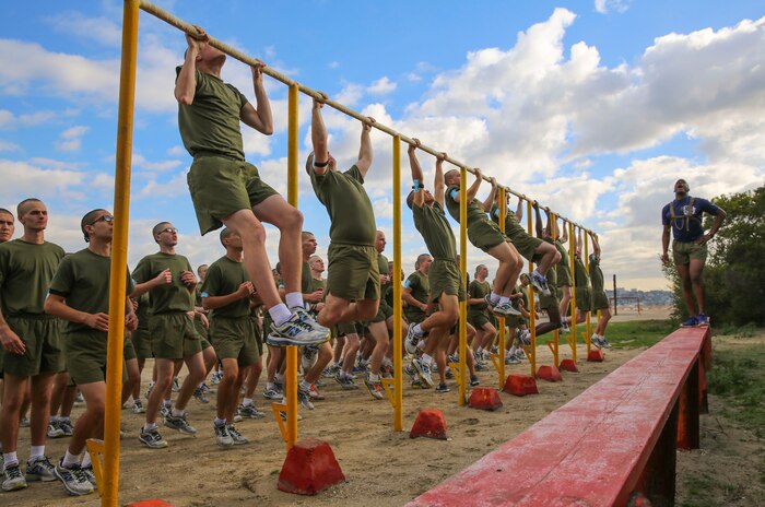 Recruits of India Company, 3rd Recruit Training Battalion, conduct pull-ups during a physical training event at Marine Corps Recruit Depot San Diego, Dec. 28. Each recruit had to push themselves to ensure they were getting the most out of each exercise. Annually, more than 17,000 males recruited from the Western Recruiting Region are trained at MCRD San Diego.