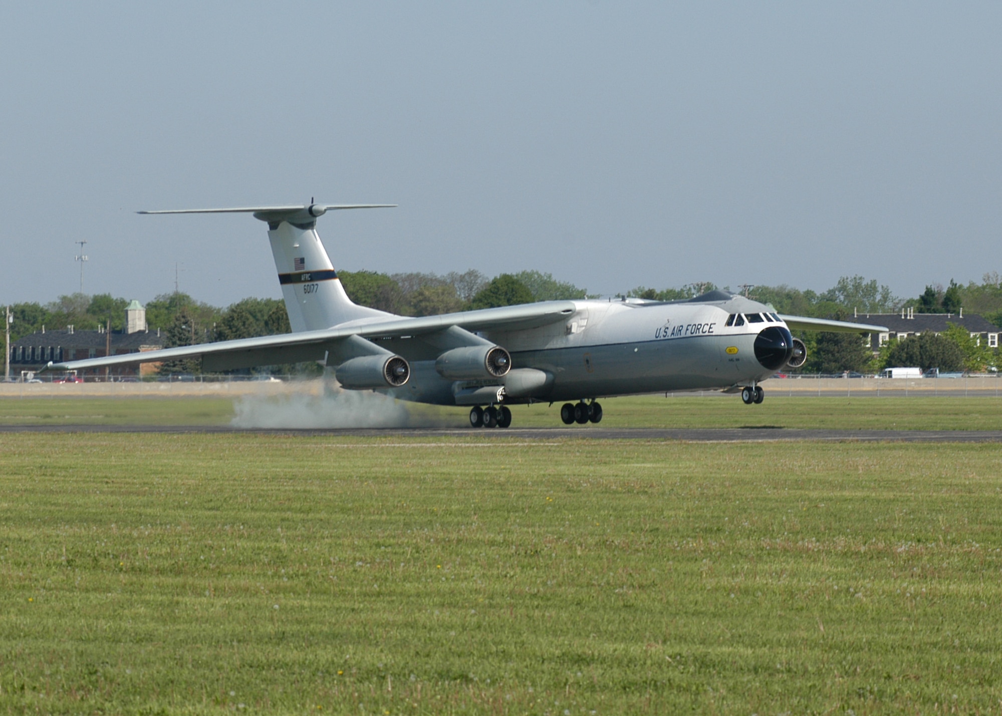 The C-141 "Hanoi Taxi" touches down at the National Museum of the U.S. Air Force during its final flight on May 6, 2006. The "Hanoi Taxi" was the first aircraft to return Vietnam prisoners of war to the United States on Feb. 12, 1973. (U.S. Air Force photo by Jeff Fisher)