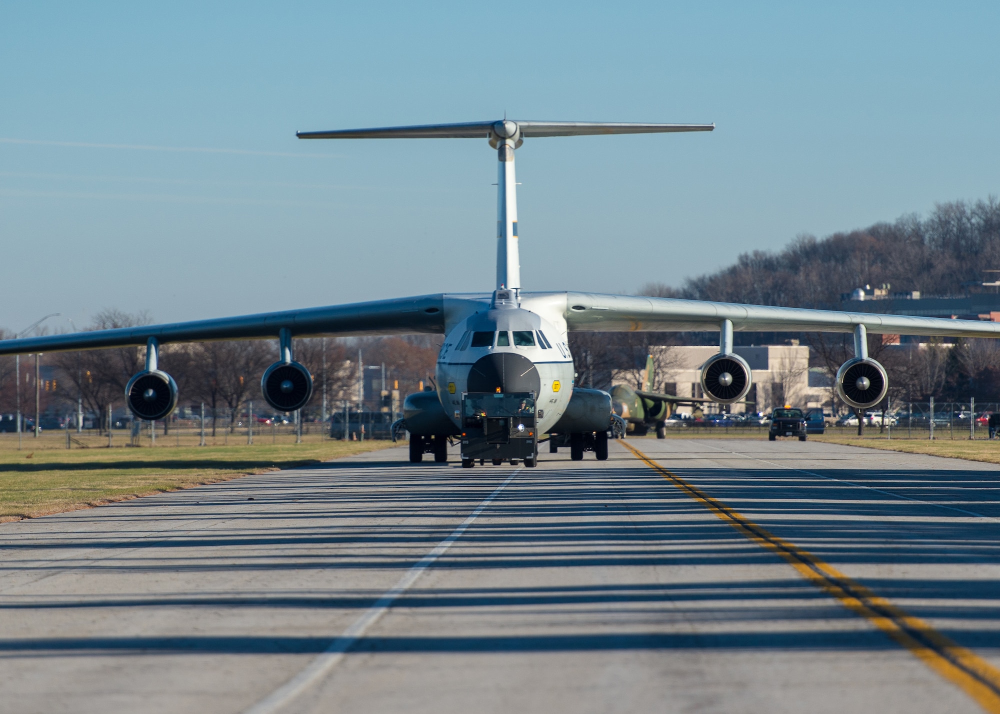 Restoration staff move the Lockheed C-141C Hanoi Taxi into the new fourth building at the National Museum of the U.S. Air Force on Dec. 16, 2015. (U.S. Air Force photo by Jim Copes)