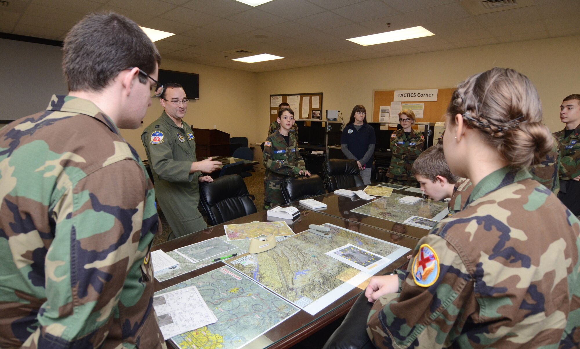 Capt. Bart Clark from the 700th Airlift Squadron briefs Civil Air Patrol Cadets on preflight operations during a visit to Dobbins Air Reserve Base, Ga. Dec. 30, 2015. The cadets were from units in Georgia, Florida and Alabama. (U.S. Air Force photo/Don Peek)