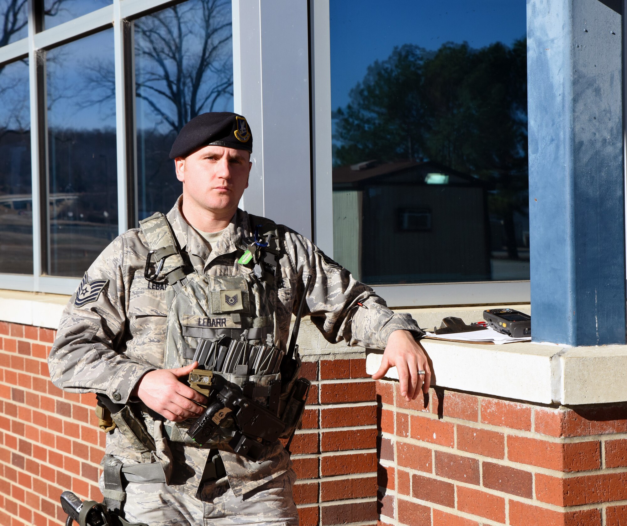 Tech. Sgt. Cameron Lebarr, 188th Security Forces Squadron supervisor, stands on post Dec. 22, 2015 at the front gate of the 188th Wing at Ebbing Air National Guard Base, Fort Smith, Ark. Lebarr has been selected as The Flying Razorback Spotlight for January. (U.S. Air National Guard photo by Senior Airman Cody Martin/Released)