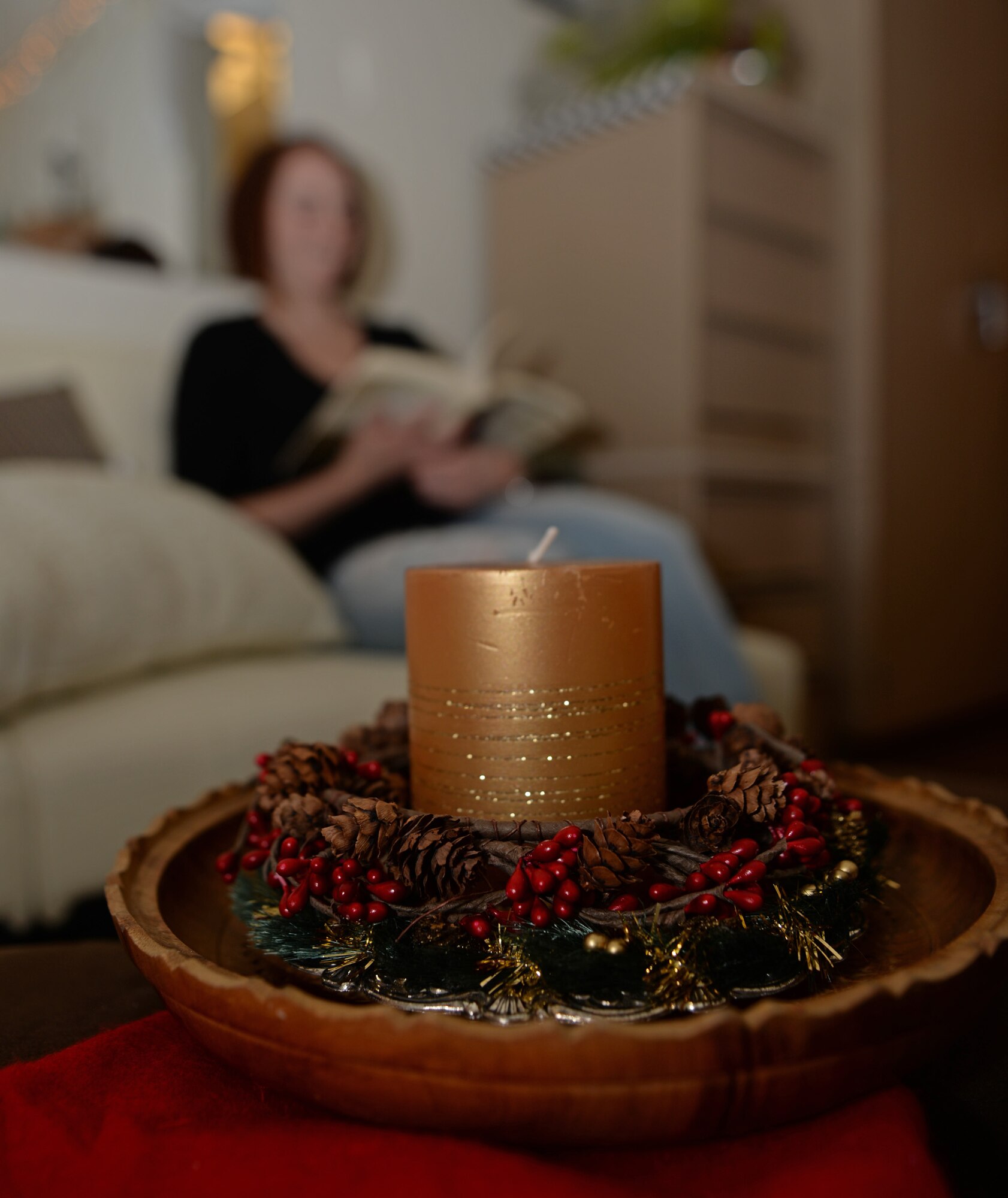 Airman 1st Class Karen Wren, 28th Operations Support Squadron analyst, uses Christmas decorations as a way to get in the holiday spirit at Ellsworth Air Force Base, S.D., Dec 8, 2015. Many dorm Airmen experience their first Christmas away from home and use decorating as a way to boost morale. (U.S. Air Force photo by Airman 1st Class James L. Miller/Released)