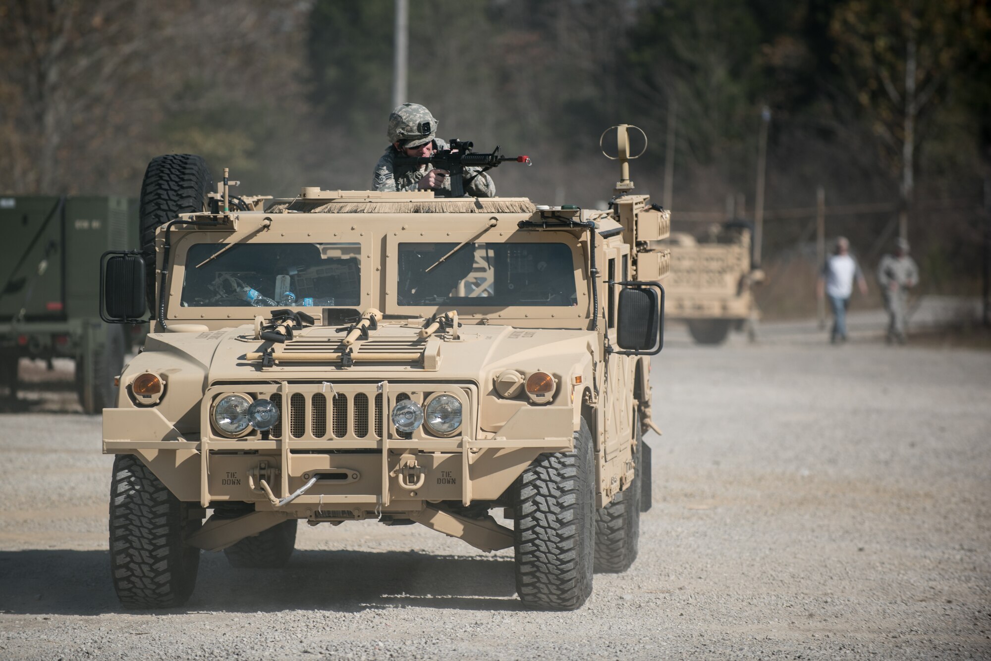 Senior Airman Jacob Faith, a Fire Team member from the Kentucky Air National Guard’s 123rd Security Forces Squadron, defends his position under fire at a simulated Afghan military compound during training at Fort Knox, Ky., Oct. 20, 2015. Faith and his fellow Airmen also executed a search for a downed pilot. (U.S. Air National Guard photo by Maj. Dale Greer)