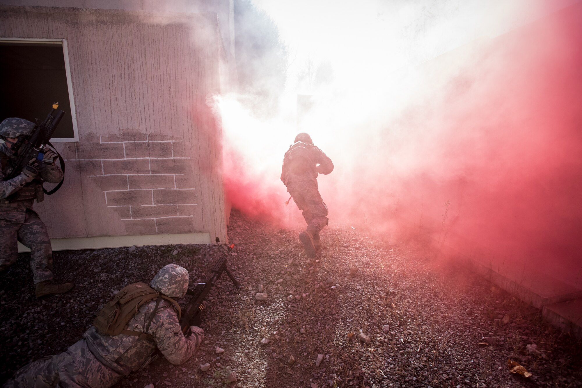 Fire Team members from the Kentucky Air National Guard’s 123rd Security Forces Squadron conduct training to recover a downed pilot inside a simulated Afghan Village at Fort Knox, Ky., Oct. 20, 2015. The Airmen were required to execute a coordinated search while defending their positions and engaging hostile enemy forces. (U.S. Air National Guard photo by Maj. Dale Greer)