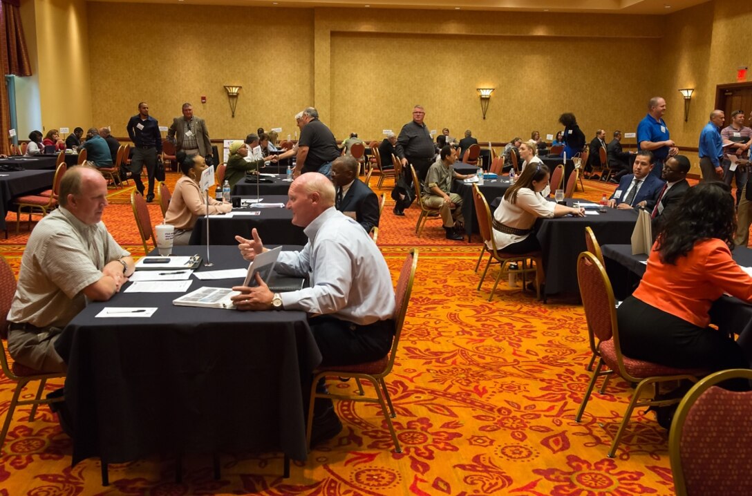 Future vendors participating in "matchmaking" sessions at the Indian Country
Business Summit, co-sponsored by two Oklahoma PTACs in August 2015. These networking
events let small-business representatives make connections with government agencies and prime contractors.
