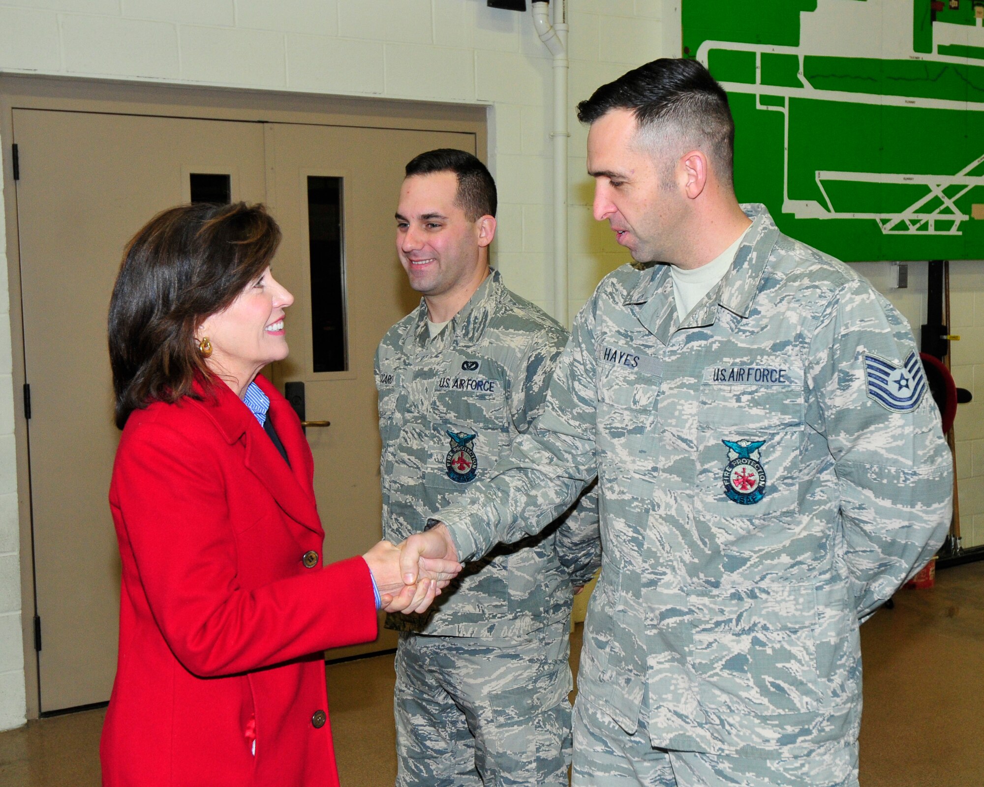 New York State Lt. Governor Kathy Hochul wishes a safe and Happy New Year to Technical Sgt. Matt Hayes, Crash Rescue Firefighter, 914th Airlift Wing and other members at the Niagara Falls Air Reserve Station, New York on December 31, 2015. Hochul stopped by to thank the troops for their service, some of whom will be deploying to Southwest Asia in the New Year. (U.S. Air Force photo by Peter Borys)