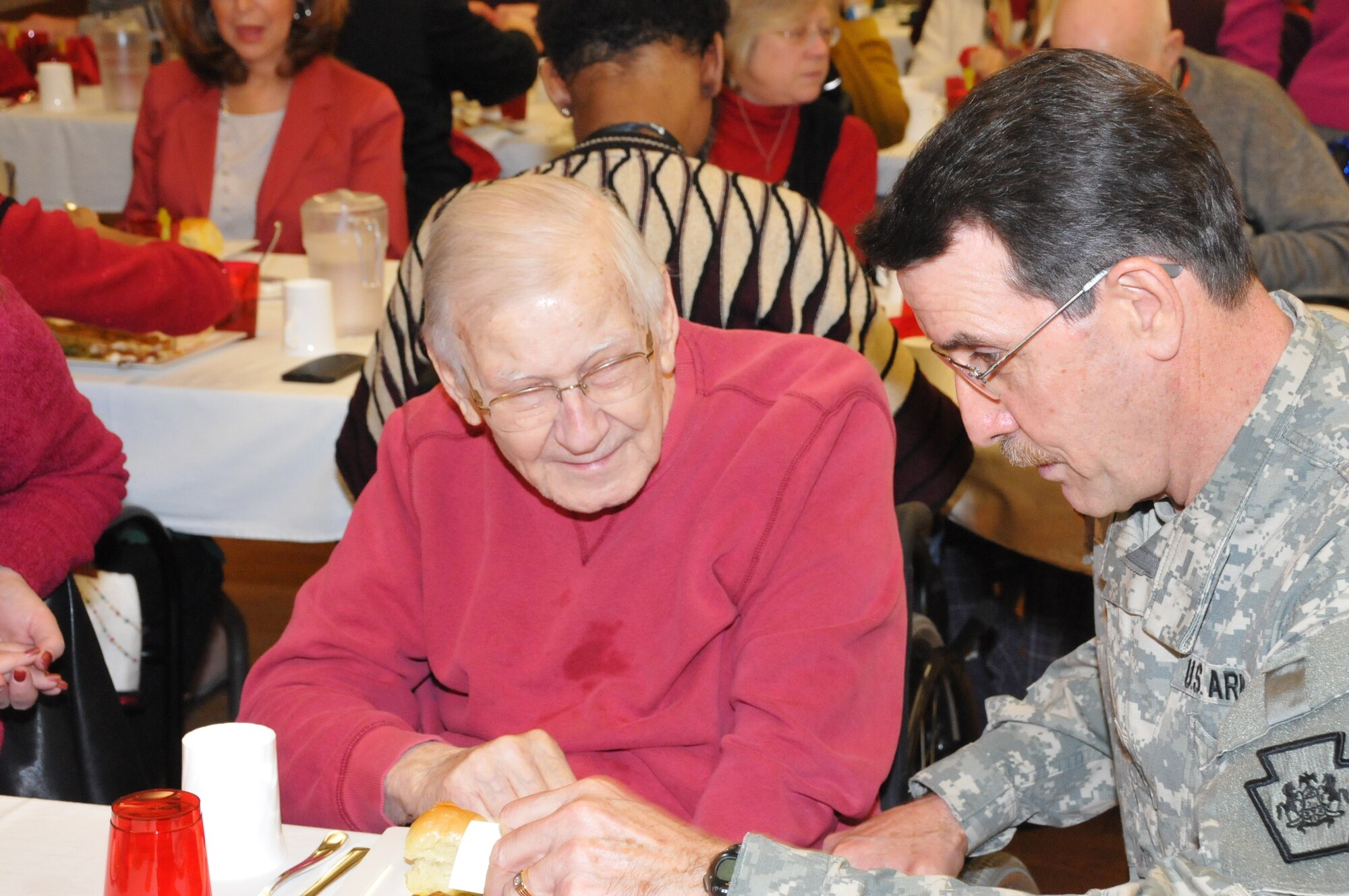 Air National Guardsmen from the 171st Air Refueling Wing, including the Commander of the 171st, Col. Gregg Perez, visited veterans this holiday season at the Southwestern Veterans Center in Pittsburgh, Pa. with Maj. Gen. James Joseph, the Adjutant General and Brig. Gen. Anthony Carrelli, the Deputy Adjutant General – Air. Dec. 15, 2015. During the visit guardsmen talked with the veteran residence and thanked them for their service. Guardsmen also served lunch, drinks and deserts to the veterans during their holiday meal.  (U.S. Air National Guard Photo by Major Karen Bogdan/Released)  