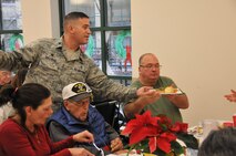 Air National Guardsmen from the 171st Air Refueling Wing, including the Commander of the 171st, Col. Gregg Perez, visited veterans this holiday season at the Southwestern Veterans Center in Pittsburgh, Pa. with Maj. Gen. James Joseph, the Adjutant General and Brig. Gen. Anthony Carrelli, the Deputy Adjutant General – Air. Dec. 15, 2015. During the visit guardsmen talked with the veteran residence and thanked them for their service. Guardsmen also served lunch, drinks and deserts to the veterans during their holiday meal.  (U.S. Air National Guard Photo by Major Karen Bogdan/Released)  