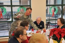 Air National Guardsmen from the 171st Air Refueling Wing, including the Commander of the 171st, Col. Gregg Perez, visited veterans this holiday season at the Southwestern Veterans Center in Pittsburgh, Pa. with Maj. Gen. James Joseph, the Adjutant General and Brig. Gen. Anthony Carrelli, the Deputy Adjutant General – Air. Dec. 15, 2015. During the visit guardsmen talked with the veteran residence and thanked them for their service. Guardsmen also served lunch, drinks and deserts to the veterans during their holiday meal.  (U.S. Air National Guard Photo by Major Karen Bogdan/Released)  