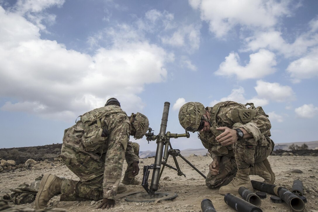 U.S. soldiers fire an M224 mortar system during a live-fire exercise near Camp Lemonnier, Djibouti, Dec. 16, 2015. U.S. Air Force photo by Senior Airman Cory D. Payne