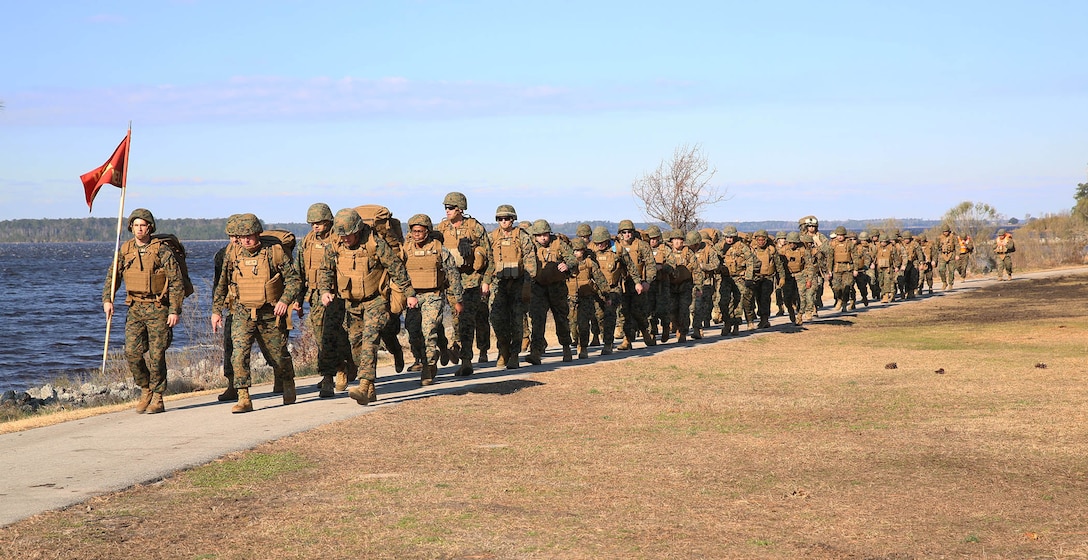 U.S. Marines and Navy Sailors with the 22nd Marine Expeditionary Unit march in a five-mile unit hike at Marine Corps Base Camp Lejeune, N.C., Jan. 30, 2015. The unit conducted the hike to maintain unit readiness and build morale. (U.S. Marine Corps photo by Cpl. Caleb McDonald/Released)