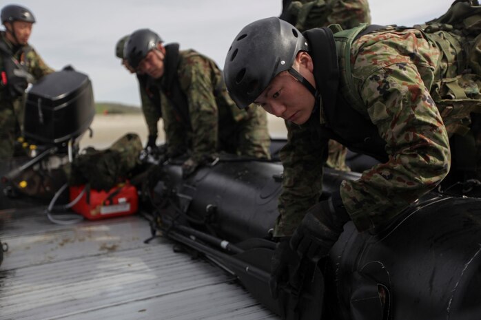 Marines with 1st Reconnaissance Battalion, 1st Marine Division, teach Basic Maneuver Techniques for the Combat Rubber Raiding Craft to members of the Japan Ground Self-Defense Force aboard Camp Pendleton on Jan. 28, 2015, during Exercise Iron Fist 2015 to help develop the Self-Defense Force’s understanding of amphibious operations. Exercise Iron Fist 15 is an annual bilateral training exercise between U.S. and Japanese military forces that builds their combined ability to conduct amphibious and land-based contingency operations. IF15, currently in its tenth iteration, is scheduled from Jan. 26 to Feb. 27, 2015, in southern California. (U.S. Marine Corps photo by Lance Cpl. Angel Serna/Released)