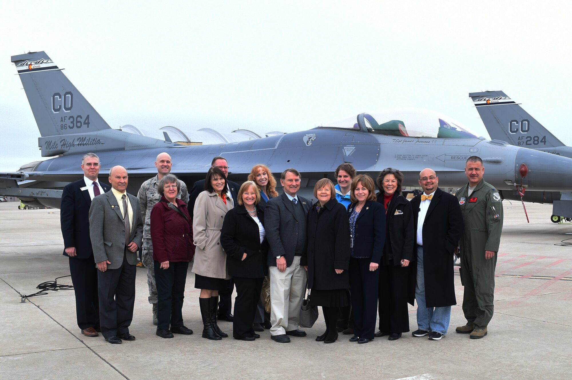 Members of the Colorado State Legislature pose in front of an F-16 during a base tour Jan. 31, 2015, on the flightline on Buckley Air Force Base, Colo. The tour also included the Army Aviation Support Facility and a behind-the-scenes look at the inside of a radome. (U.S. Air Force photo by Airman 1st Class Samantha Saulsbury/Released)