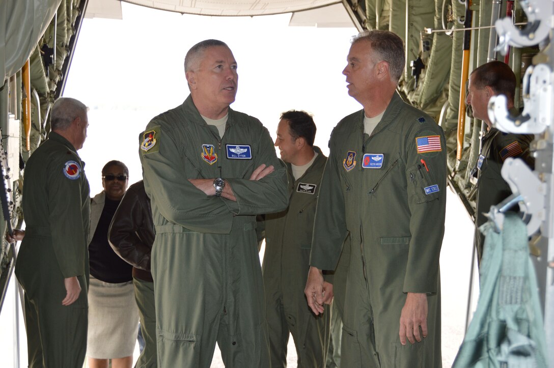 TYNDALL AIR FORCE BASE, Fla. – In the back of a WC-130J aircraft, also known as a “Hurricane Hunter,” Lt. Gen. William Etter, Commander, Continental U.S. NORAD Region - 1st Air Force (Air Forces Northern), talks with Lt. Col. Keith Gibson, Director of Operations, 53rd Weather Reconnaissance Squadron, a Reserve unit from Keesler Air Force Base, Miss. Gibson and other aircrew members were here to participate in a two-day working group about WC-130J mission capabilities. Prior to their departure, they opened the aircraft to tours for Tyndall members and local media representatives. ( U.S. Air Force photo by Mary McHale/Released)