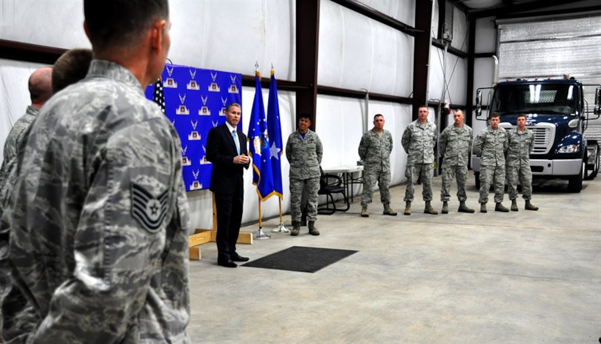 Brad Bentley, Truckload Carriers Association and Professional Truck Driver Institute president, speaks to the first Department of Defense class to graduate with PTDI certification at a ceremony held at Dobbins Air Reserve Base, Georgia, Jan. 23.  (U.S. Air Force photo/Senior Airman Daniel Phelps/released)