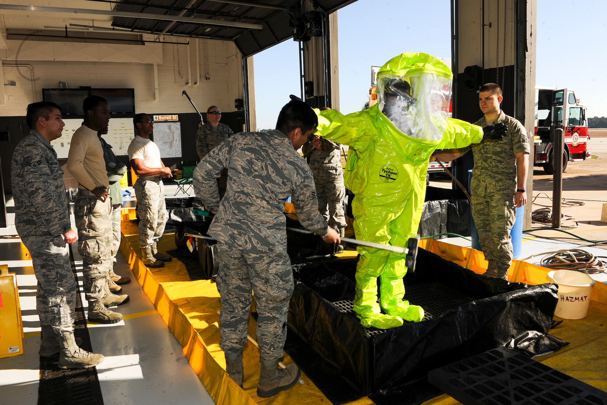 Airmen from the 23d Civil Engineer Squadron fire flight and the 23d Aerospace Medicine Squadron bioenvironmental flight take part in a hazardous material training, Jan. 28, 2015, at Moody Air Force Base, Ga. The 23d CES fire, explosive ordnance disposal and emergency management flights hold monthly joint training along with the 23d AMDS bioenvironmental flight. (U.S. Air Force photo by Senior Airman Sandra Marrero/Released)
