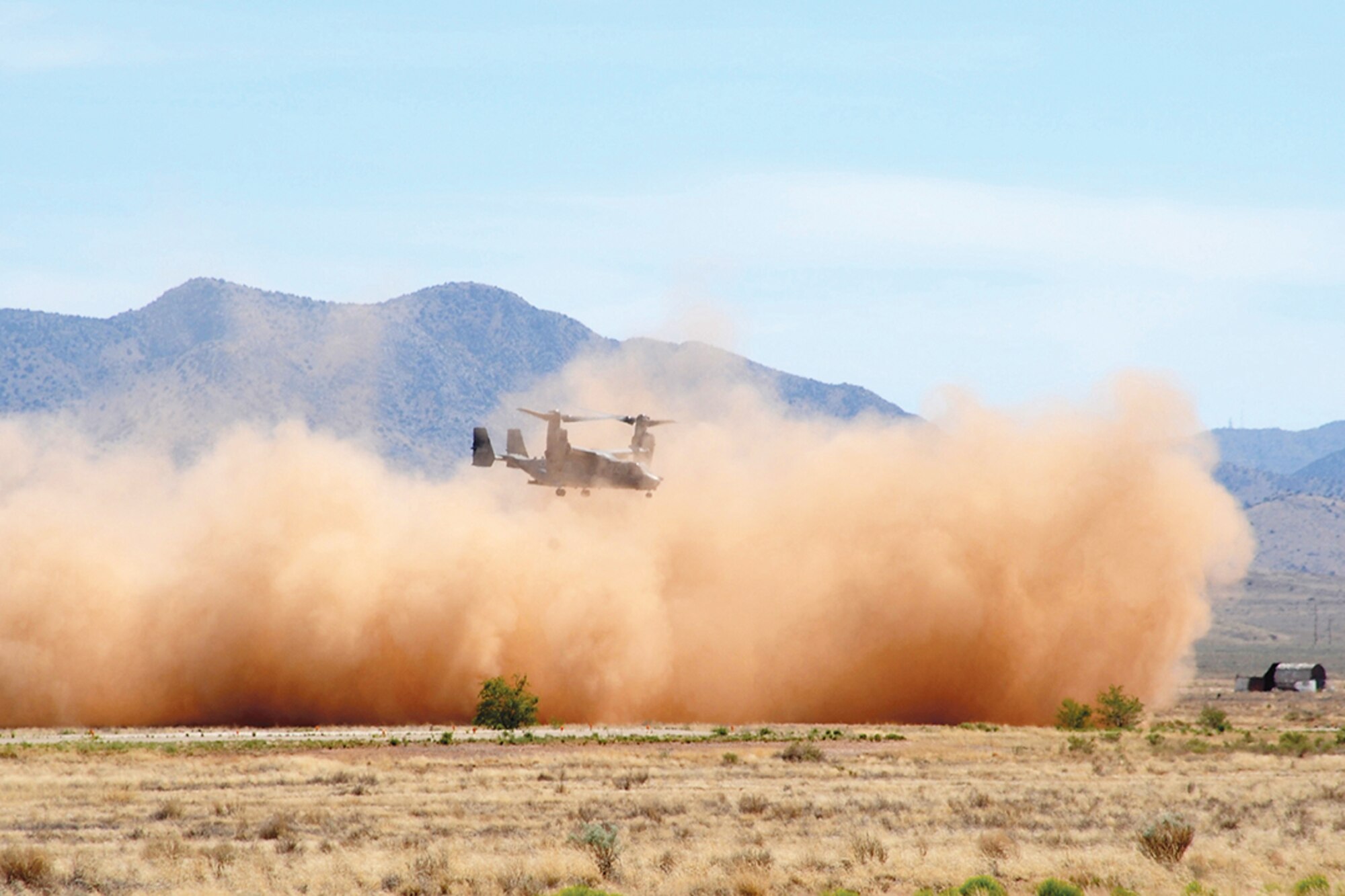 Kirtland's 58th Special Operations Wing has a plan to mitigate aircraft engine damage that happens during training missions using a biodegradable binding material at practice landing zones. TerraLOC binds the dirt in a landing zone together so as to not stir up as much blowing dirt when a CV-22 Osprey lands there. (Courtesy photo)