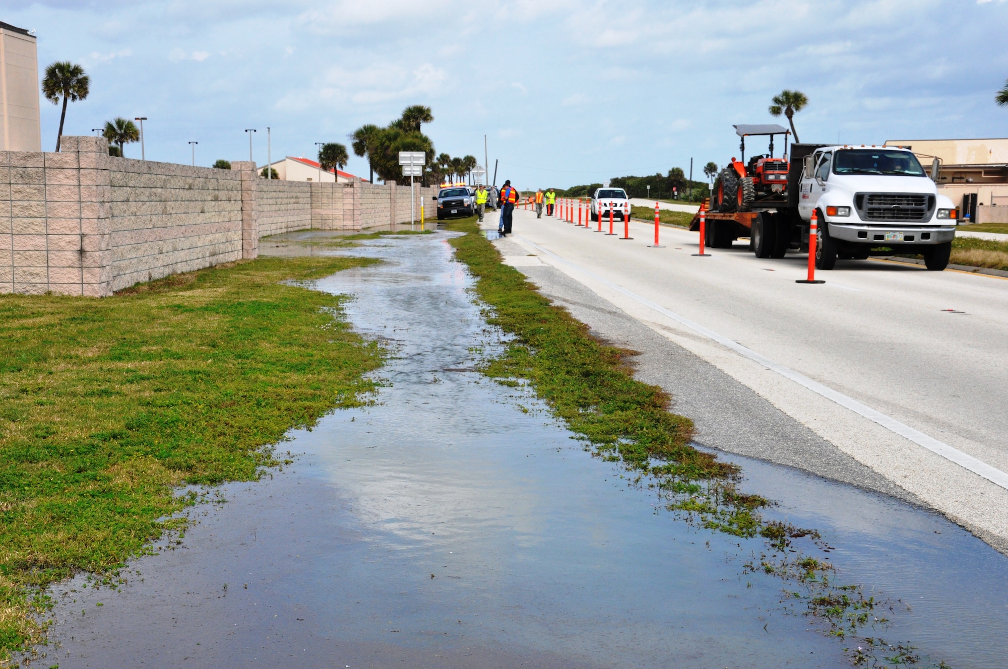 Members of the 45th Civil Engineer Squadron working to repair the broken waterline on Florida State Road A1A Feb. 2, 2015. (U.S. Air Force photo/1st Lt. Alicia Wallace)
