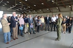 Col. Jodi Neff, 12th Flying Training Wing vice commander, briefs legislators and their staff members Jan. 29, 2015 at Joint Base San Antonio-Randolph, Texas. The 12th FTW hosted Texas legislators and their staff members at JBSA-Randolph.  Members of the 12th FTW highlighted their mission's impact on national security, as well as briefed on mitigating current encroachment issues. The legislators and their staff members visited with military members during lunch, participated in a flight simulation demonstration and were given a briefing on, "A Day in the Life of a Pilot."  (U.S. Air Force photo by Johnny Saldivar)