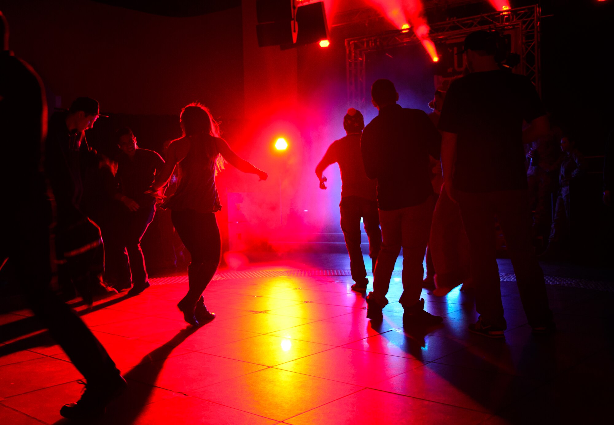 Kaiserslautern Military Community members dance to Electronic Dance Music at Ramstein Air Base, Germany. The USO and 86th Force Support Squadron hosted Disc Jockeys Kraddy, Ana Sia, SuperVision and Paul Basic as part of an EDM tour. (U.S. Air Force photo/Senior Airman Armando A. Schwier-Morales)