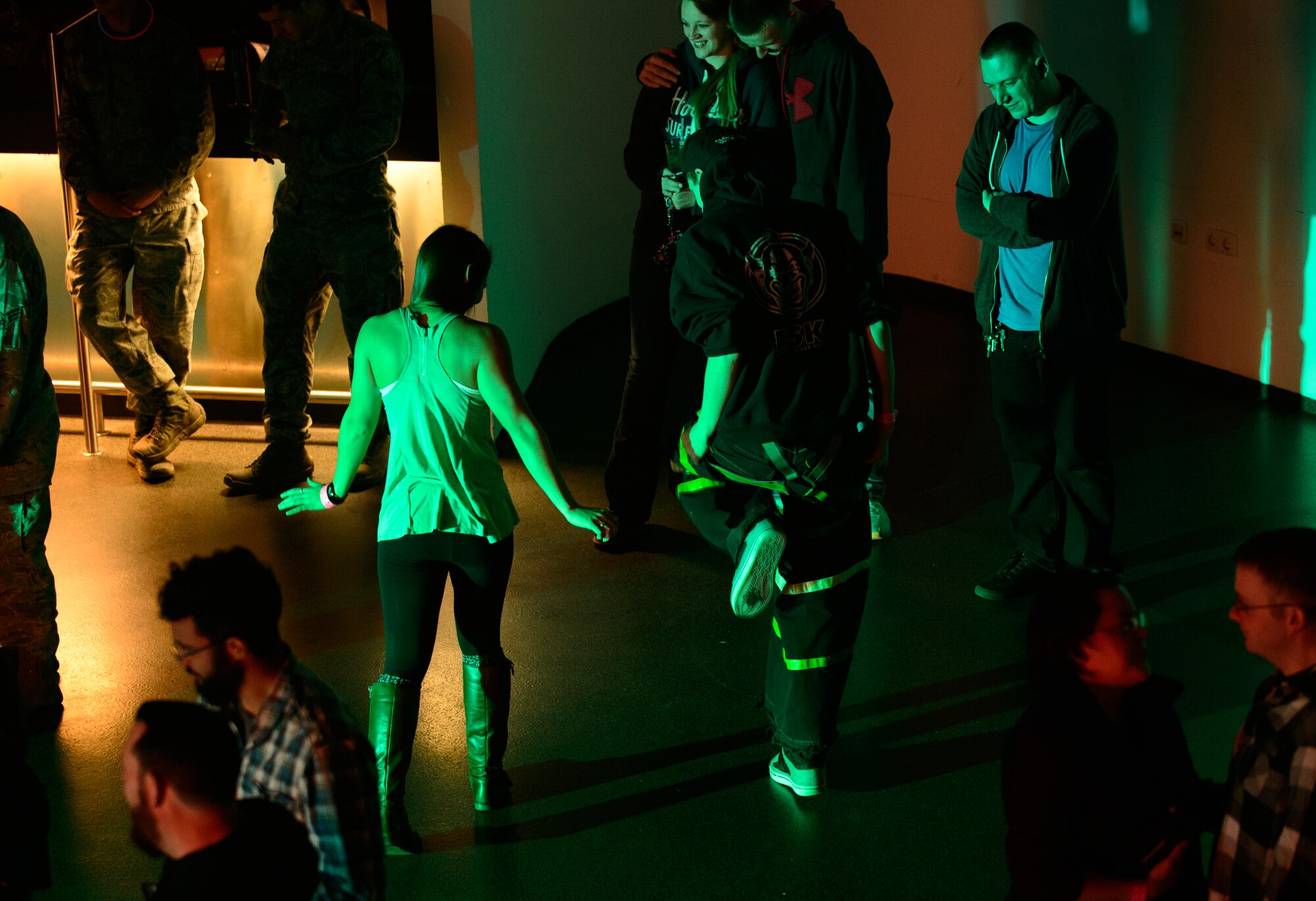 Kaiserslautern Military Community members teach each other Electronic Dance Music moves during a performance by four EDM disc jockeys at Ramstein Air Base, Germany, Jan 30, 2015. The USO hosted four disc jockeys to play for the troops around Europe. (U.S. Air Force photo/Senior Airman Armando A. Schwier-Morales)