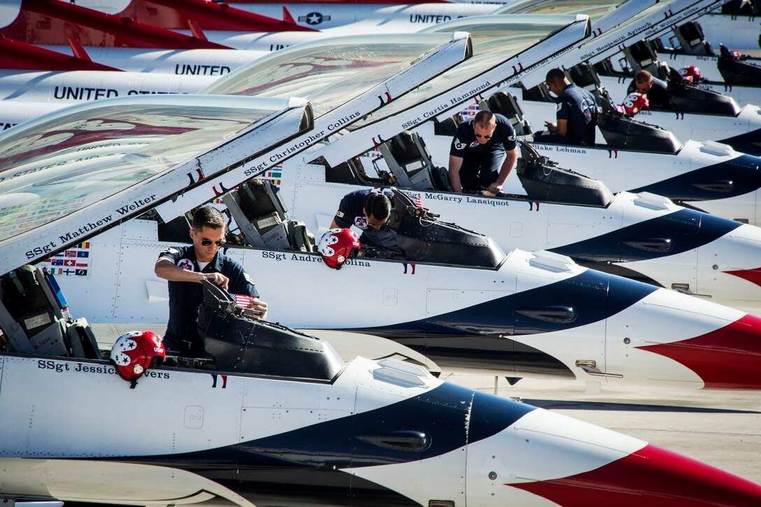 Thunderbirds maintenance professionals prepare their aircraft for the Super Bowl XLIX flyover on Nellis Air Force Base in Nev., Feb. 1, 2015. 