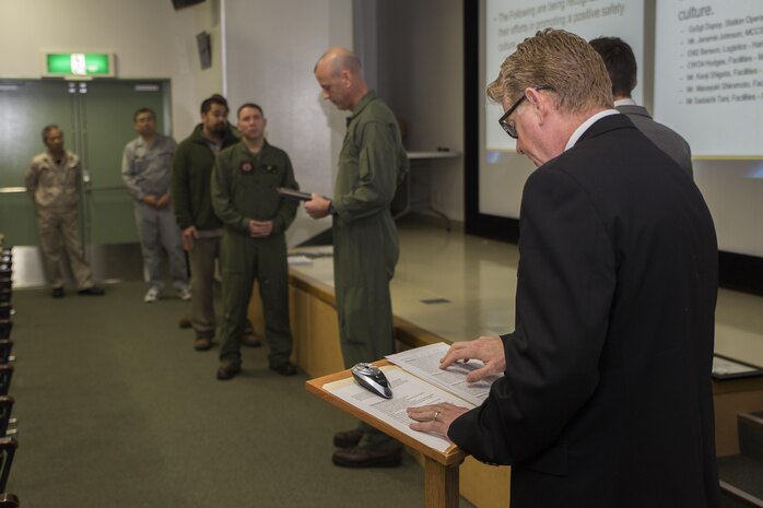 Richard Perry, the safety director with the Station Safety Office, gave a brief on Voluntary Protection Program implementation to the leaders of Marine Corps Air Station Iwakuni, Japan, during the VPP Kick-Off inside Building One, Jan. 15, 2015. VPP is a formal safety system that draws experience and participation from everyone, beginning with the newest member through upper management.