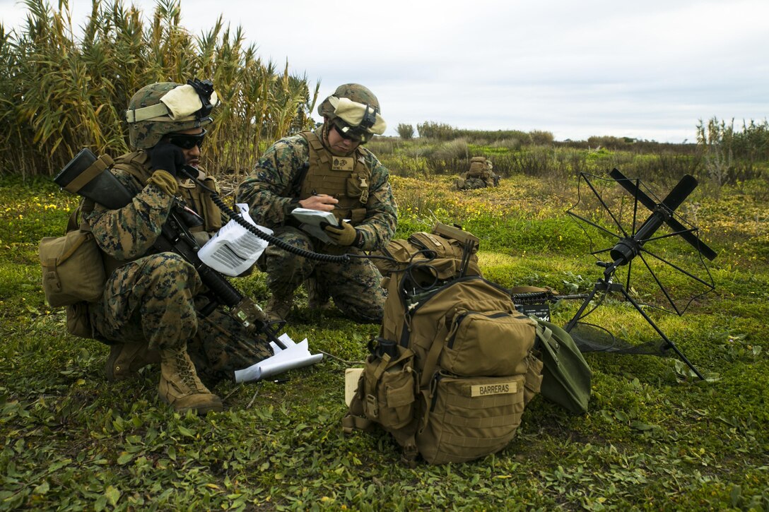 Lance Cpl. Jason Barreras, a field radio operator with Special-Purpose Marine Air-Ground Task Force Crisis Response – Africa helps coordinate the extraction of a simulated casualty during an alert-force drill at Rota Air Base, Spain, Jan. 29, 2015. Barreras helped maintain constant communication with unit commanders and essential personnel as they completed the unscripted mission, which was designed to test the unit’s ability to rapidly adapt and respond to a crisis situation. (U.S. Marine Corps photo by Sgt. Paul Peterson/Released)