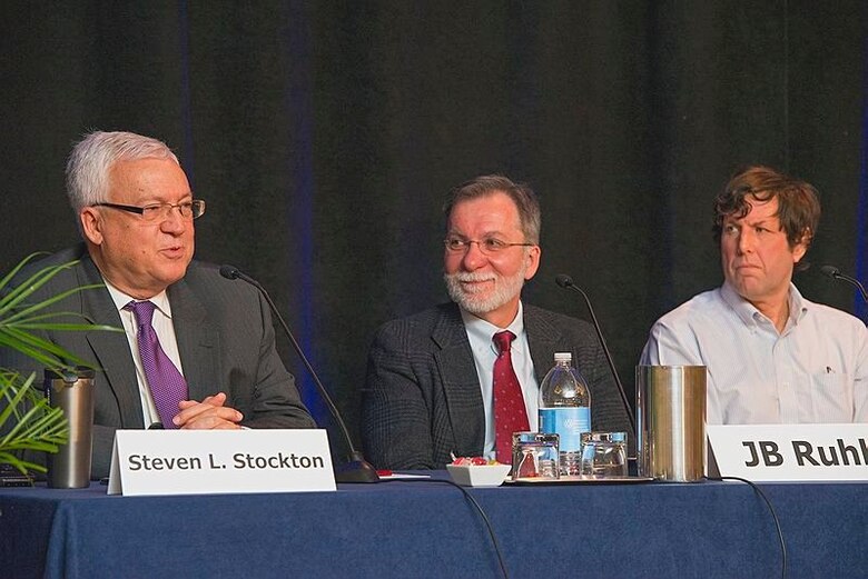 Mr. Steve Stockton, Mr. J.B. Ruhl, and Dr. Stephen Polasky discuss the current 
status of ecosystem services during the plenary session of the 2014 ACES Conference.
