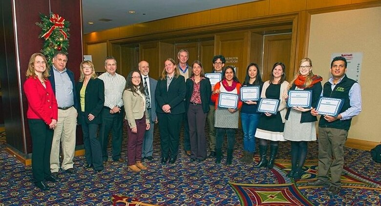 Ms. Janet Cushing (fifth from the left) and the ACES Conference Planning Committee present graduate students with awards for the conference. Each of these students was selected to present their research on ecosystem services at this year’s conference.