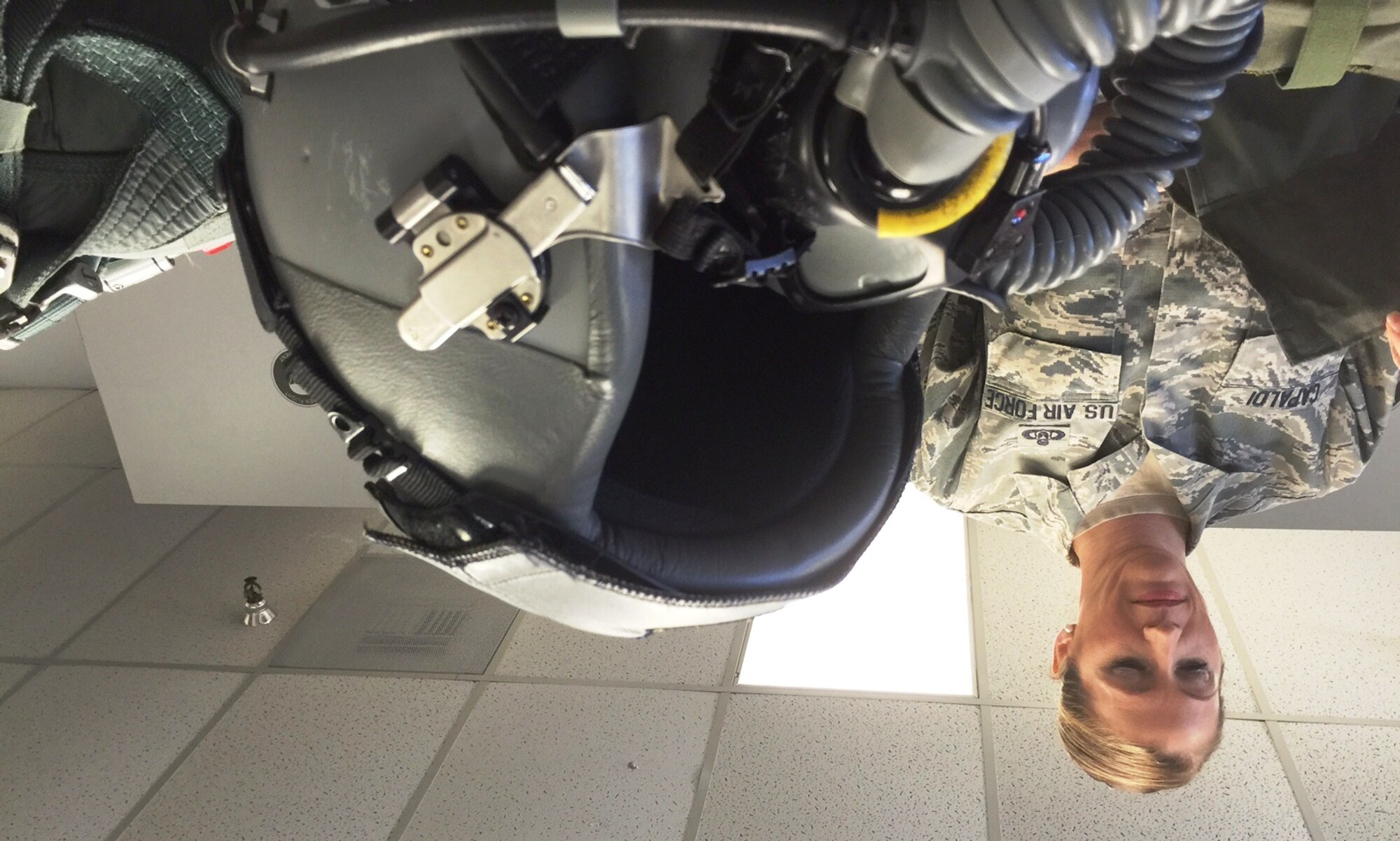 Senior Master Sgt. Dana Capaldi inspects flight equipment at the 339th Flight Test Squadron. Capaldi was recently named the Air Force's top senior noncommissioned officer of the year in the Air Reserve Component Aircrew Flight Equipment annual awards. (U.S. Air Force photo/Capt. Christine Miner)