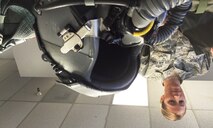 Senior Master Sgt. Dana Capaldi inspects flight equipment at the 339th Flight Test Squadron. Capaldi was recently named the Air Force's top senior noncommissioned officer of the year in the Air Reserve Component Aircrew Flight Equipment annual awards. (U.S. Air Force photo/Capt. Christine Miner)