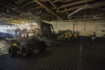 U.S. Marines and sailors conduct routine operations on the USS Kearsarge (LHD3) in support of Bold Alligator 14, Oct. 30, 2014. Exercise Bold Alligator 14 is a multi-national, synthetic naval exercise designed to train the full range of amphibious capabilities in order to provide unique and contemporary solutions to global challenges.
