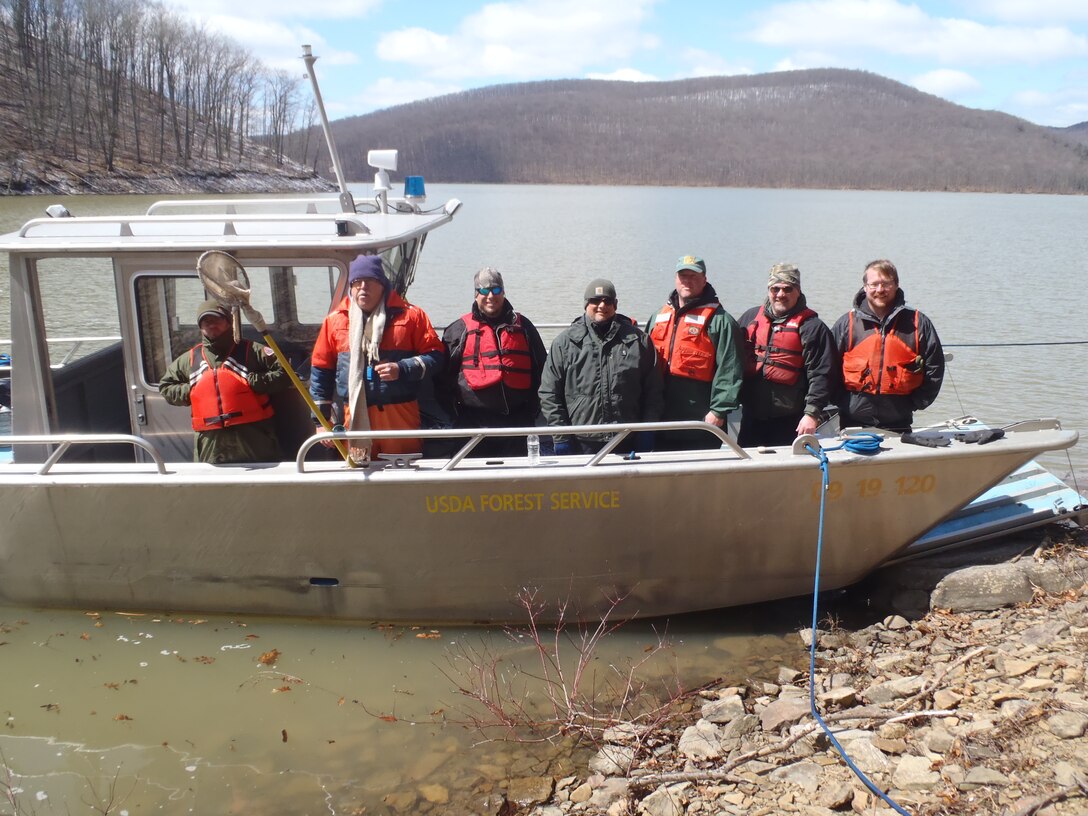 Staff from the USDA Forest Service, PA Fish and Boat Commission, Seneca Nation of Indians, and US Army Corps of Engineers participate in a 2014 interagency fisheries survey at Allegheny Reservoir.         