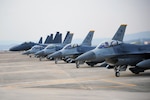 DAEGU AIR BASE, Republic of Korea (Feb. 3, 2015) - Four F-16 Fighting Falcons and four F-15K Slam Eagles prepare to take-off to conduct their first aerial formation training scenario during Exercise Buddy Wing 15-2.   Buddy Wing exercises are part of a combined fighter exchange program designed to improve interoperability between U.S. Air Force and ROK Air Force fighter units. 