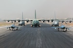 BAF BASE BANGABANDHU, Bangladesh (Jan. 28, 2015) - Two Bangladesh F-7BG Defenders, a BAF C-130B Hercules, and two U.S. Air Force C-130H Hercules aircraft prepare to take off during Exercise COPE SOUTH. The U.S. C-130H is assigned to the 374th Airlift Wing, Yokota Air base, Japan; the BAF F-7BGs are assigned to 5th Squadron and the BAF C-130B is assigned to 101st Special Flying Unit at BAF Base Bangabandhu. COPE SOUTH is a Pacific Air Forces-sponsored, bilateral tactical airlift exercise conducted in Bangladesh, with a focus on cooperative flight operations, day and night low-level navigation, tactical airdrop, and air-land missions as well as subject-matter expert exchanges in the fields of operations, maintenance and rigging disciplines. 
