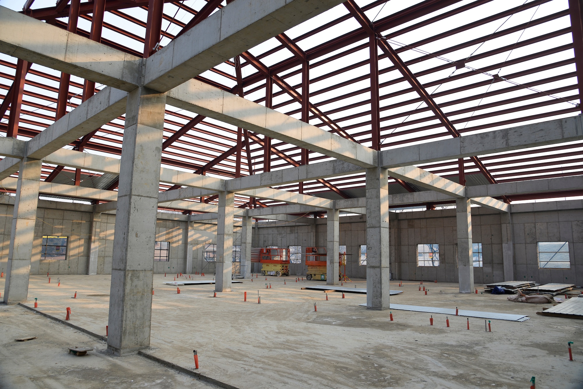 An addition to the Medical Group facility is being erected, pictured here, Feb. 4, 2015, at Osan Air Base, Republic of Korea. The project is one of several hundred being coordinated amongst the 51st Civil Engineer Squadron, the U.S. Army Corp of Engineers Far-East District and host-nation contractors.   (U.S. Air Force photo by Senior Airman Matthew Lancaster)