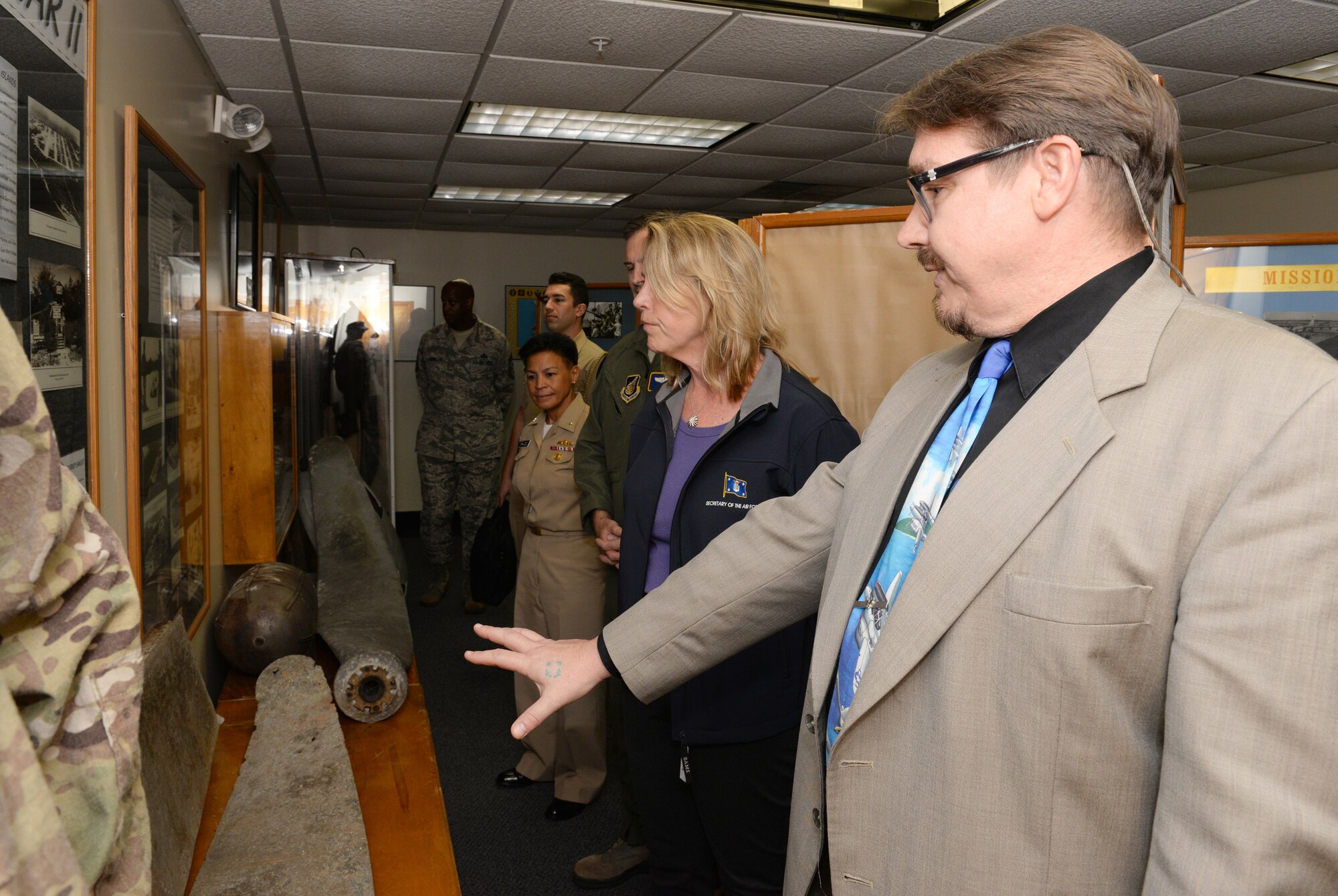 Jeffrey Meyer, 36th Wing historian, shows Secretary of the Air Force Deborah
Lee James historical items from World War II in the Andersen Museum at the
base passenger terminal Feb. 3, 2015, at Andersen Air Force Base, Guam.
James spent several hours at Andersen as part of a re-fueling stop while
returning to Washington DC after a region visit which included stops in
Antarctica and New
Zealand supporting Operation Deep Freeze.

