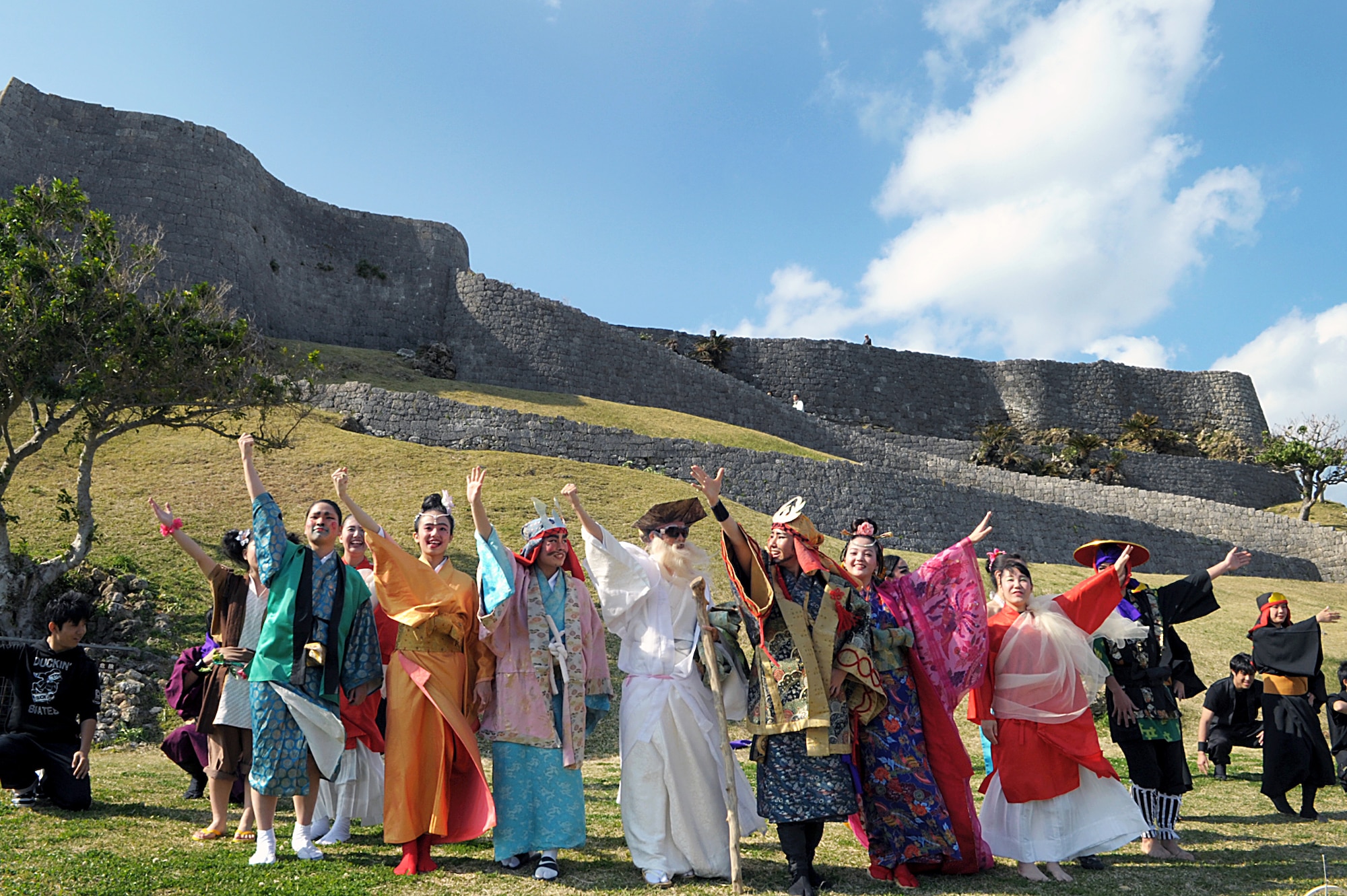 A group of local youth poses for photos in front of the Katsuren Castle ruins on Okinawa, Japan, on Jan. 25, 2015. The group dressed in period costume to perform dances and sing songs in honor of Lord Katsuren, the first lord of the castle in the 13th century. (U.S. Air Force photo by Tim Flack)