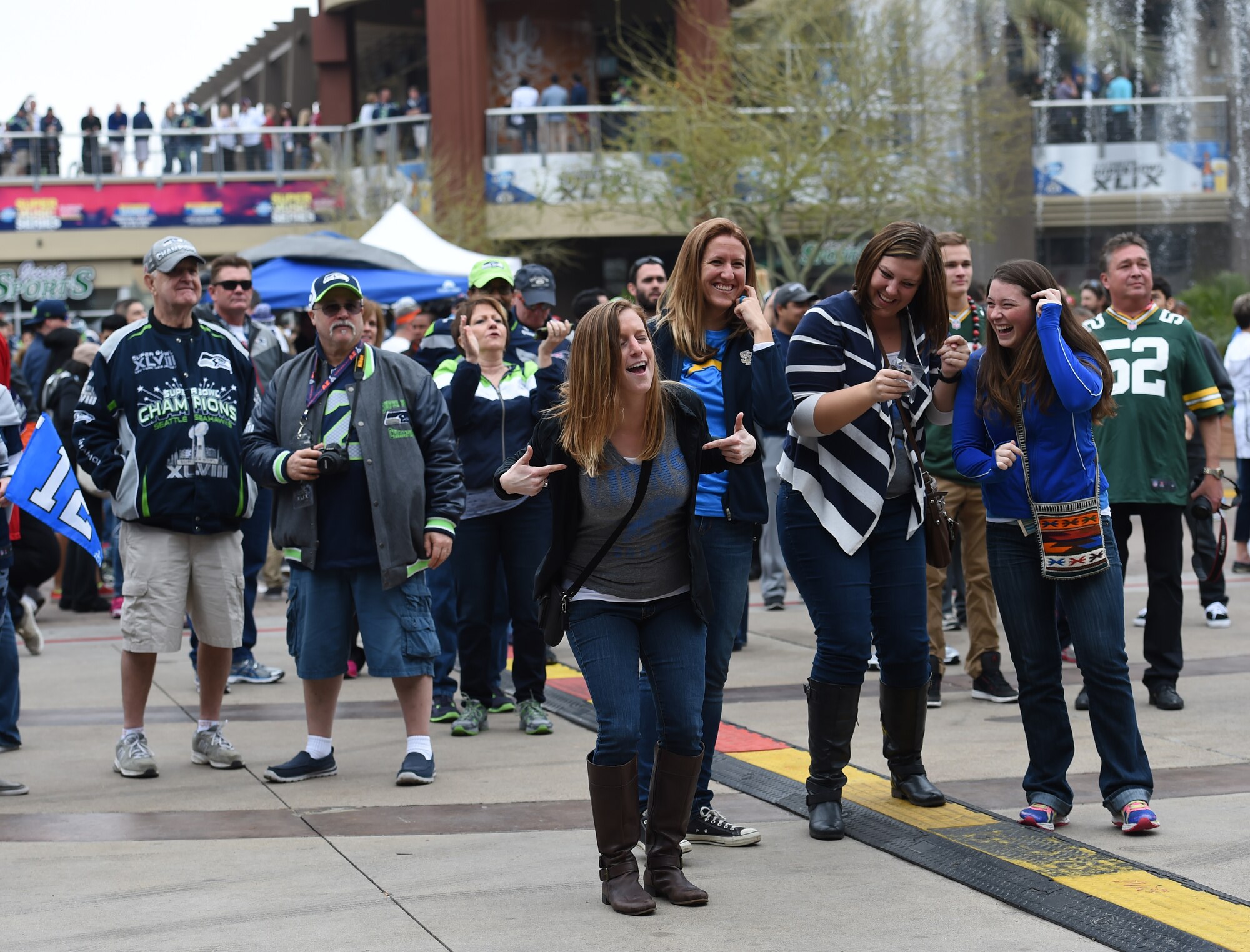 Super Bowl XLIX fans dance and sing during Max Impact’s performance at Westgate Entertainment District in Glendale, Az., Feb. 1, 2015. Max Impact is the U.S. Air Force’s premier rock band.  (U.S. Air Force photo/ Senior Airman Nesha Humes)