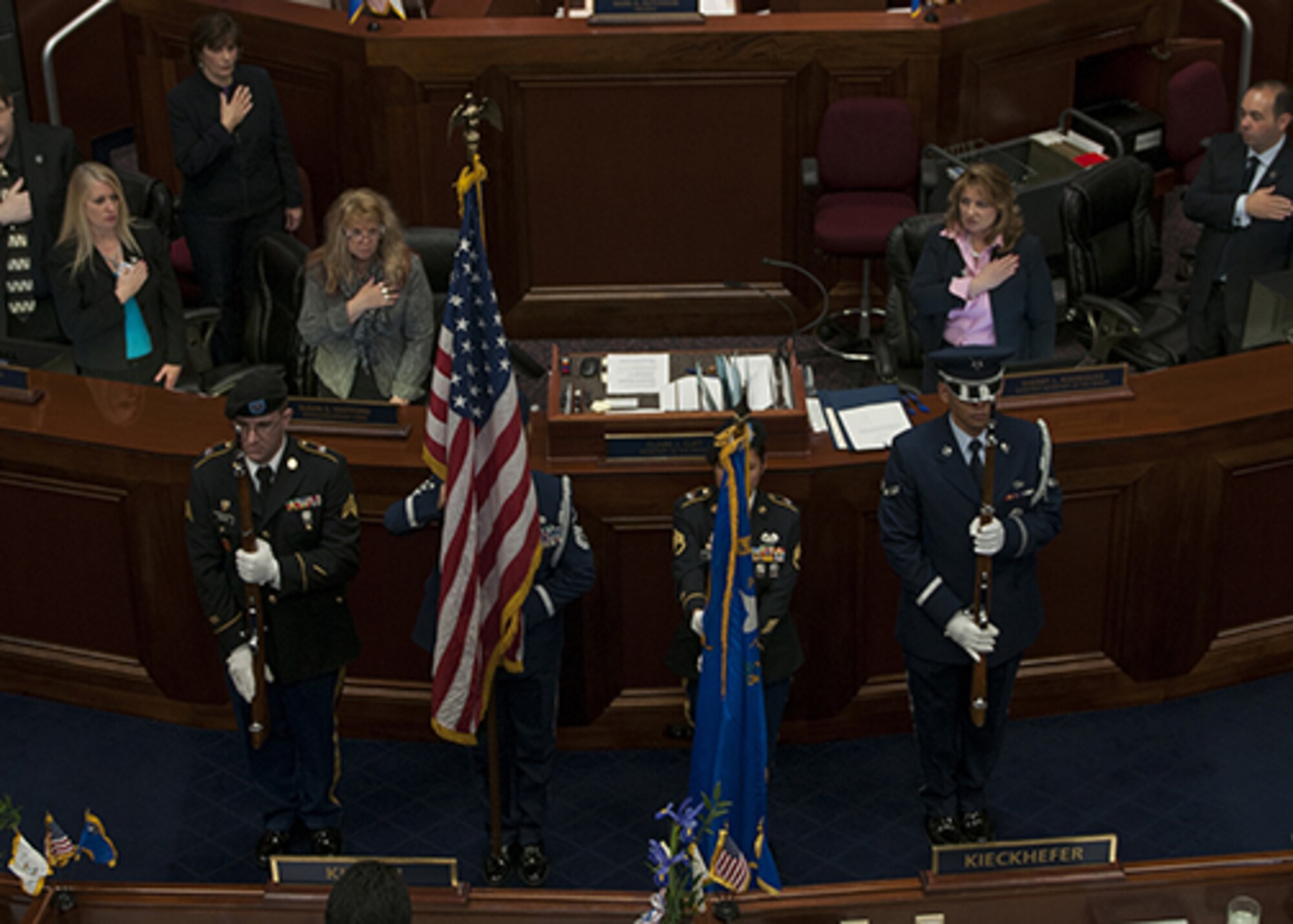 (From left) Sgt. Robert Green, Master Sgt. Suzanne Connell, Staff Sgt. Rose Kemp and Airman 1st Class David Almada at the opening ceremonies for Nevada’s 78th Legislative Session in the Senate Chambers, Carson City on Feb. 2nd just after noon. The Guardsman formed a joint color guard to represent the Nevada National Guard for the ceremony.

Photo by Staff Sgt. Mike Getten, Joint Force Headquarters Public Affairs.
