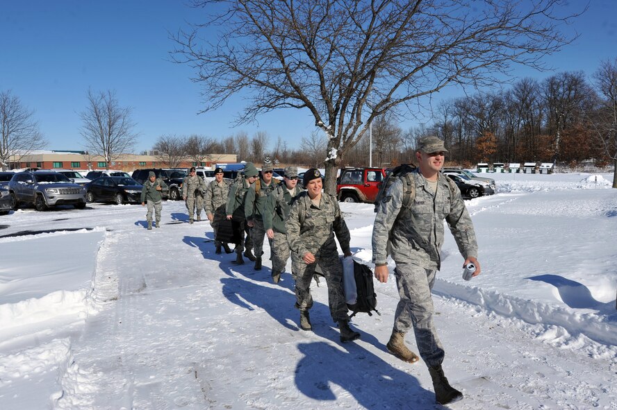 U. S. Air Force Airmen from the 180th Fighter Wing’s Security Forces Squadron returned home from a six month overseas deployment to more than 12 inches of snow Feb. 2, 2015. The team, made up of 13 men and women from the wing, deployed to Southwest Asia in July, 2014, to conduct an air base defense mission in support of Operations Enduring Freedom and Inherent Resolve. (Air National Guard photo by Senior Master Sgt. Beth Holliker / Released).