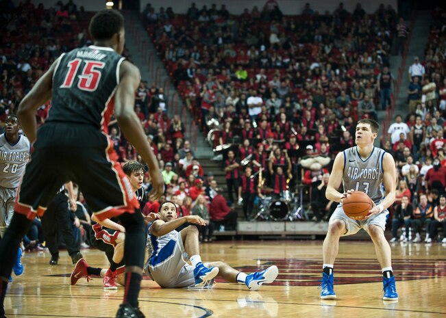 Air Force Academy guard Matt Mooney sets for a shot during a game against the University of Nevada-Las Vegas at the Thomas and Mack Center in Las Vegas Jan. 31, 2015. Mooney scored 10 points in the game after scoring a career-high 20 points in Air Force’s previous game against San Jose State on Jan. 28. (U.S. Air Force photo by Staff Sgt. Siuta B. Ika)