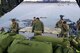 MADISON, Wis. – Soldiers from the 646th Regional Support Group HHC load a pallet into a 445th Airlift Wing C-17 Globemaster III in Madison, Wis., Jan. 18, 2015. The 89th Airlift Squadron, out of Wright-Patterson Air Force Base, Ohio, provided the 646th RSG HHC with transportation to their annual training in Virginia. This unique opportunity allowed Soldiers to learn from Airmen about preparing equipment for aerial transport. (U.S. Army photo by Sgt. 1st Class Alexander Kartanos)