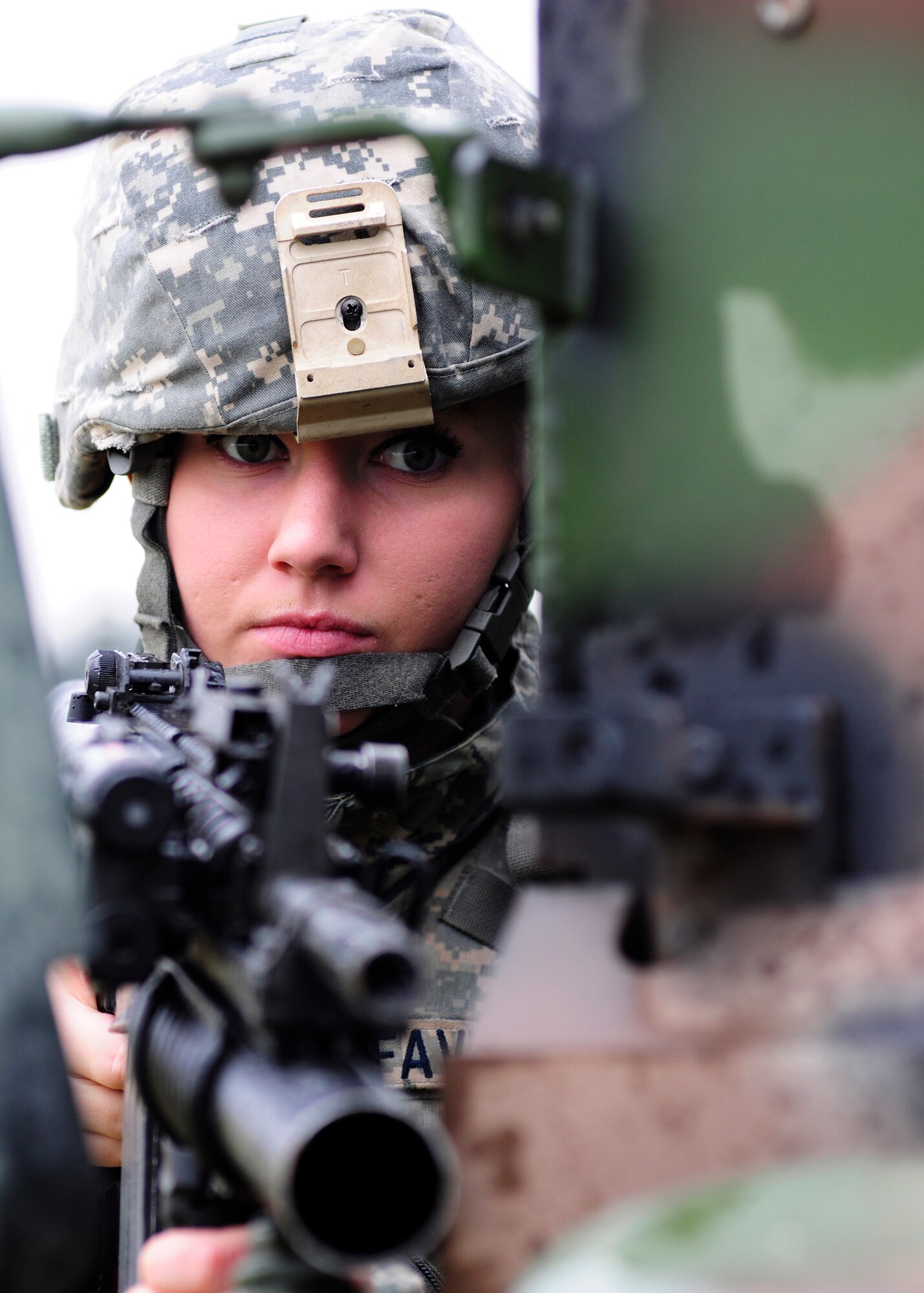 Airman Kayla Faver, 39th Security Forces Squadron security response team member, provides security during a base-wide exercise Jan. 28, 2015, at Incirlik Air Base, Turkey. Faver provided security while other security forces members secured an aircraft shelter during an active shooter exercise. (U.S. Air Force photo by Senior Airman Krystal Ardrey/Released)