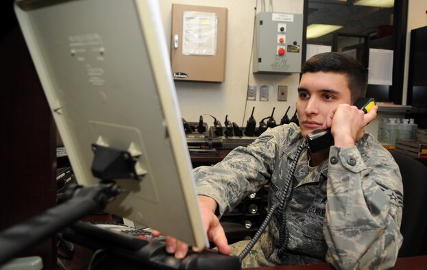 Airman of the Year: Senior Airman Phillip Walker, 4th Logistics Readiness Squadron fuel service center controller, examines the night’s flying schedule at Seymour Johnson Air Force Base, North Carolina, Feb. 2, 2015. “Wanting to apply for Officer Training School motivated me to work even harder than normal last year. Three people contributed to my success – God, for allowing me to be here, my wife, because without her support it would have been very tough, and my supervisor, for making what I do look good on paper.” (U.S. Air Force photo/Senior Airman Ashley J. Thum)