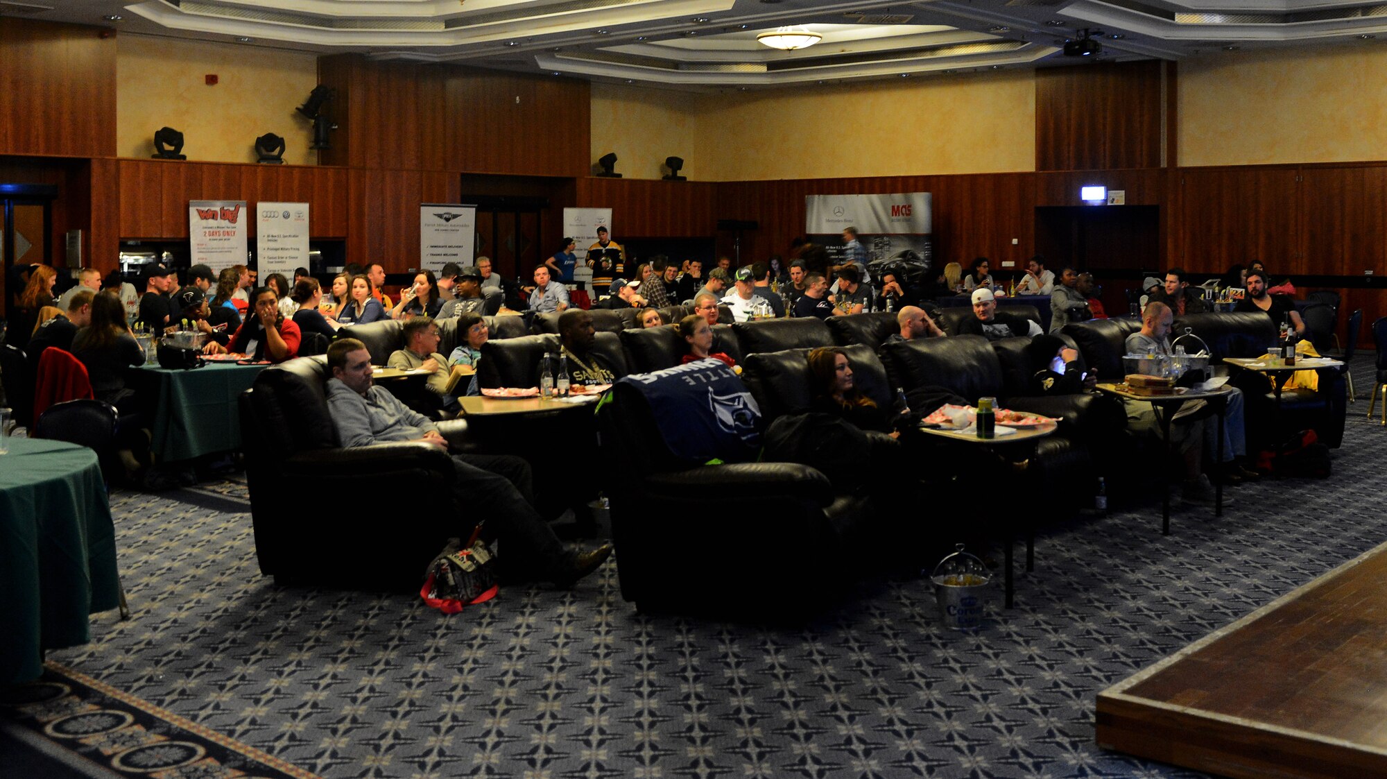 Members of the Spangdahlem community watch Superbowl XLIX at Club Eifel on Spangdahlem Air Base, Germany, Feb. 2, 2014. The game was between the New England Patriots and the Seattle Seahawks. The Patriots came out on top with a 28-24 victory. (U.S. Air Force photo by Airman 1st Class Luke Kitterman/Released)